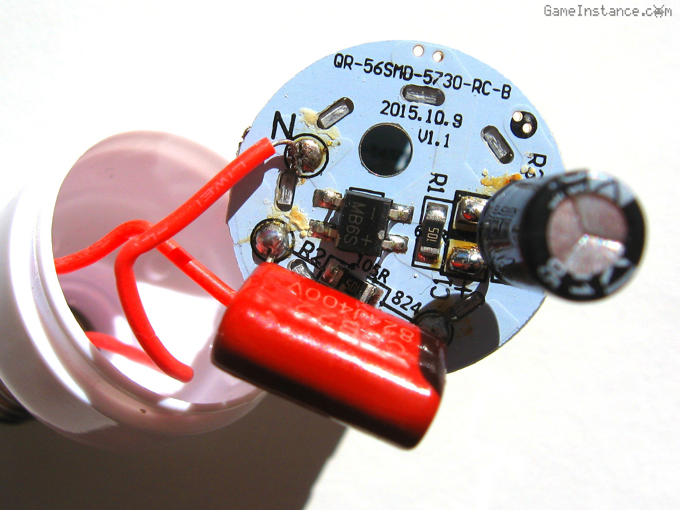 Disassembled consumer LED lamp - Corn cob seen from below, exposing the electronic components.